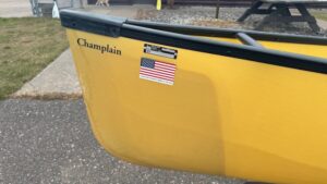 Wenonah Champlain - Aramid Ultra-Light, Black Trim, Bucket Seats, Ash Yoke, Foot Brace Installed, Integrated Skid Plates - NOS