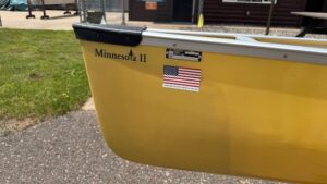Wenonah Minnesota II Canoe - Aramid Ultralight, Silver Aluminum Trim, Bucket Seats, Foot Brace.  NOS