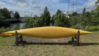 Wenonah Voyager - Aramid Ultralight, Silver Trim, Pedestal Seat, Footbrace - Factory Demo - Image 5