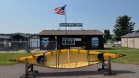 Wenonah 18 Jensen II- Aramid Ultralight, Black Trim, Bow and Stern Sliding Bucket Seats, Bailer  - Blem - Image 3