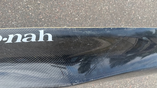 Wenonah J203 Racing Canoe - Graphite Ultra-Light - Wood Inwales w Black Accent, Center Bailer, Integrated Race Seat with Foot Brace - Blem - Image 10
