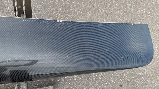 Wenonah J203 Racing Canoe - Graphite Ultra-Light - Wood Inwales w Black Accent, Center Bailer, Integrated Race Seat with Foot Brace - Blem - Image 12