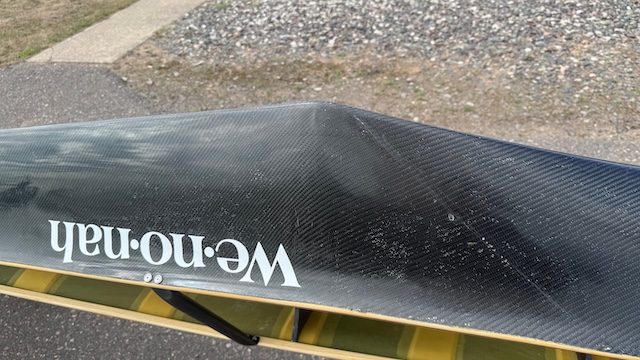 Wenonah J203 Racing Canoe - Graphite Ultra-Light - Wood Inwales w Black Accent, Center Bailer, Integrated Race Seat with Foot Brace - Blem - Image 15
