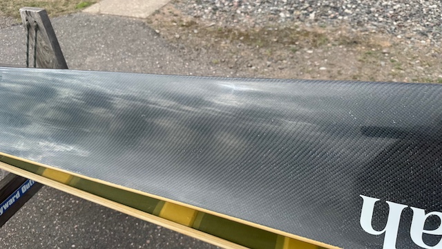 Wenonah J203 Racing Canoe - Graphite Ultra-Light - Wood Inwales w Black Accent, Center Bailer, Integrated Race Seat with Foot Brace - Blem - Image 16