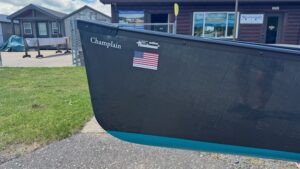 Wenonah Champlain - Graphite Ultra-Light, Gel Coat Bottom, Black Trim, Bucket Seats, Ash Yoke, Foot Brace Installed - NOS