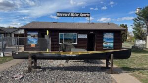 Wenonah Minnesota II Canoe - Graphite SuperLite, Wood Trim, Bucket Seats, Foot Brace - Blem